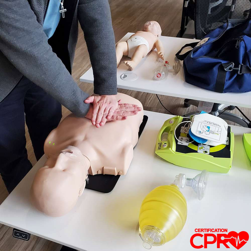 CPR training on mannequin for certification in Clearwater.