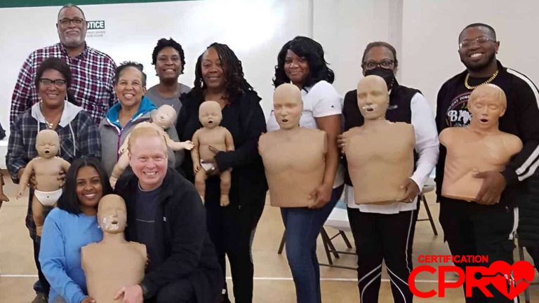 Group CPR training session in Clearwater with mannequins for certification.