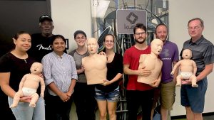Group CPR training session with mannequins in Clearwater.